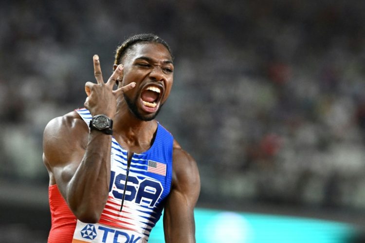 Noah Lyles celebrates his third gold medal at the outdoor World Championships in Budapest last year. ©AFP