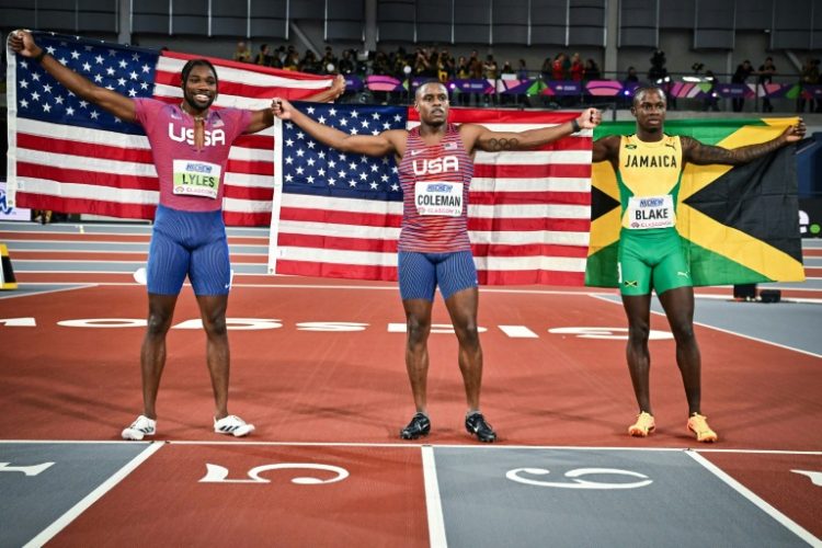 Silver medallist Noah Lyles (L), gold medallist Christian Coleman (C) and bronze medallist Ackeem Blake (R). ©AFP