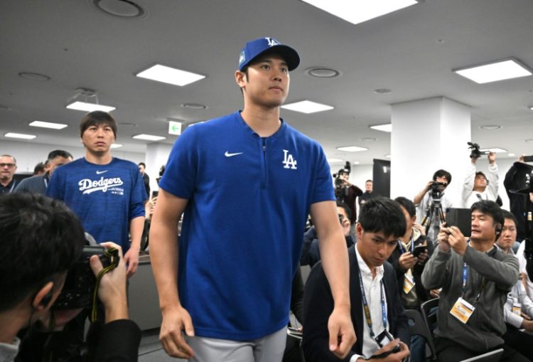 Japan's Shohei Ohtani says focused on baseball despite being the subject of sky-high global interest   . ©AFP