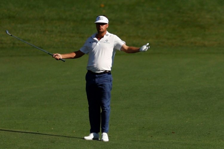 Keith Mitchell celebrates his eagle on the 18th at the PGA Valspar Championship in Florida on Saturday . ©AFP