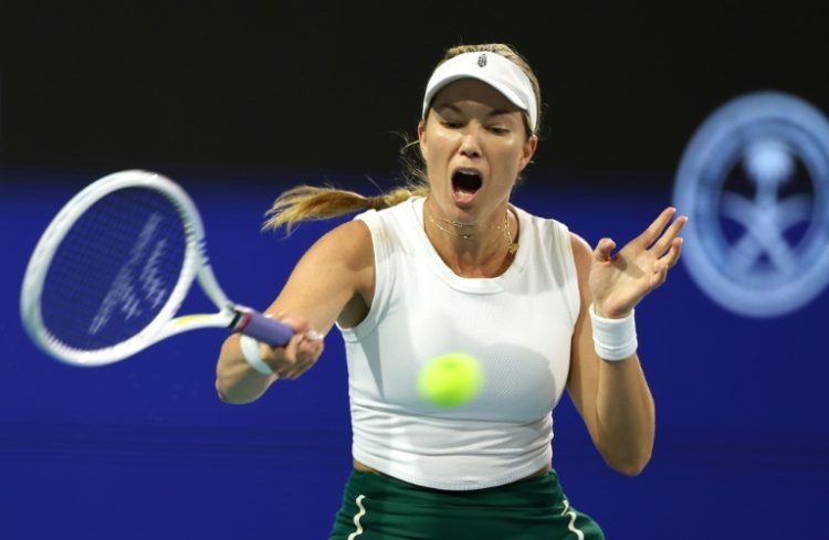Danielle Collins returns a shot against Ekaterina Alexandrova in their Miami Open semi-final on Thursday.. ©AFP