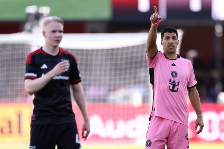 Luis Suarez, right, came off the bench to score twice for Inter Miami in a 3-1 win at D.C. United on Saturday in MLS.. ©AFP