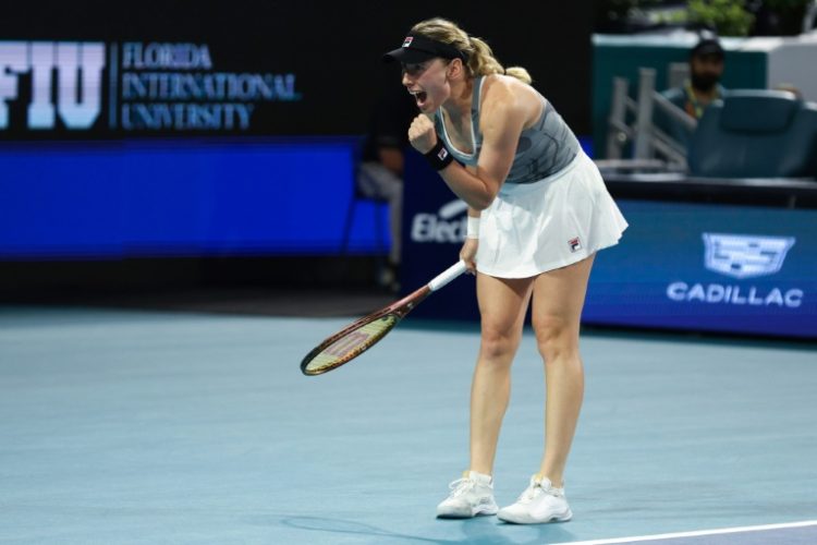 Ekaterina Alexandrova reacts after upsetting Iga Swiatek at the Miami Open on Monday. ©AFP