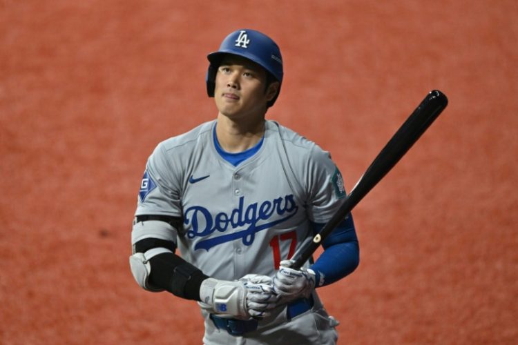 Shohei Ohtani made his official debut for the Los Angeles Dodgers against the San Diego Padres in Seoul on Wednesday. ©AFP
