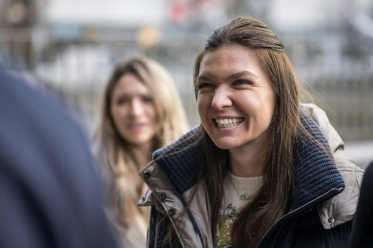 Former world number one tennis player Simona Halep arrives at the Court of Arbitration for Sport, where her doping ban was reduced to pave the way for her return to competition at the Miami Open. ©AFP