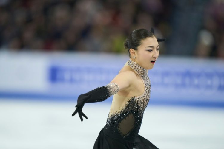 Kaori Sakamoto of Japan skates in the free skate on the way to a third straight women's title at the Figure Skating World Championships in Montreal. ©AFP