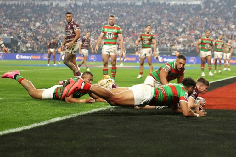 Reuben Garrick of the Manly Sea Eagles scores a try against South Sydney Rabbitohs in front of 40,000 in Las Vegas as Australian rugby league made its debut in the United States. ©AFP