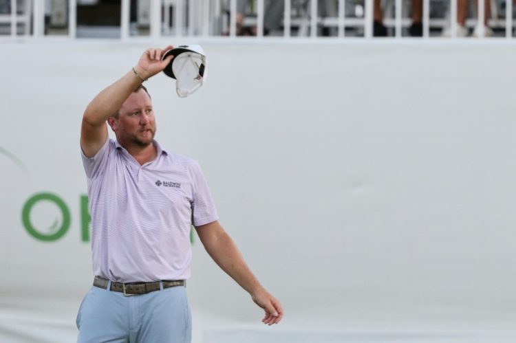 Brice Garnett of the United States celebrates his PGA Puerto Rico Open victory after a birdie on the fourth playoff hole. ©AFP