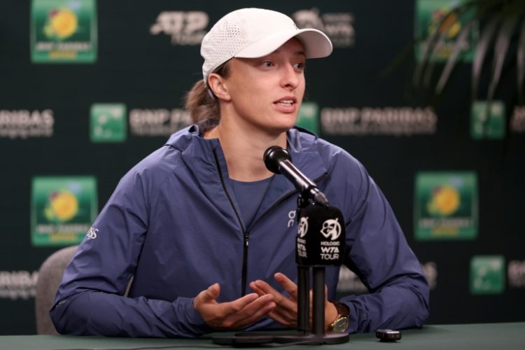World number one Iga Swiatek of Poland fields questions from the media before the Indian Wells WTA-ATP Masters. ©AFP