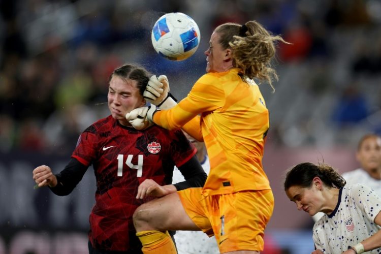 Alyssa Naeher gave away a penalty at the end of stoppage time with a foul on Vanessa Gilles before turning hero in the penalty shoot out.. ©AFP