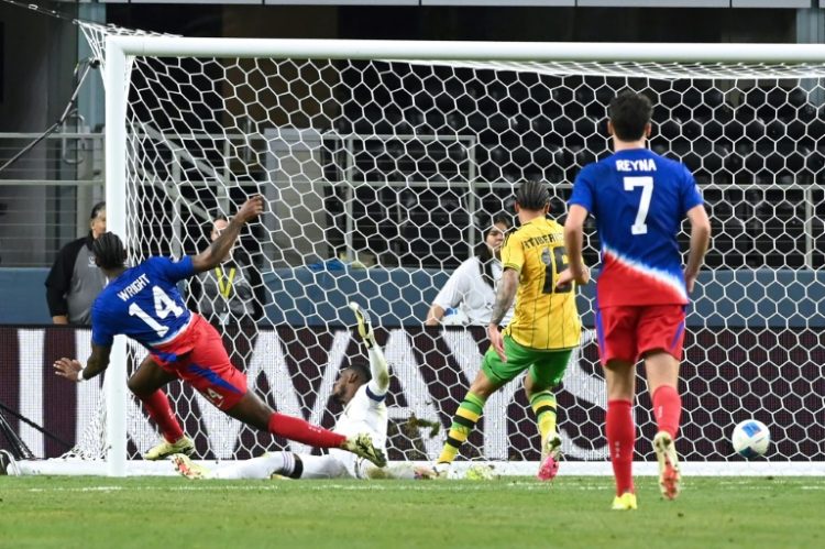 US forward Haji Wright (14) fires the hosts into the lead in their Nations League semi-final win over Jamaica . ©AFP