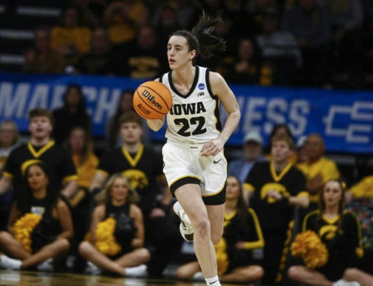 Iowa's Caitlin Clark, the all-time NCAA men's or women's basketball scoring leader, will participate in a US national team training camp next week unless the Hawkeyes are still playing for a US college crown. ©AFP