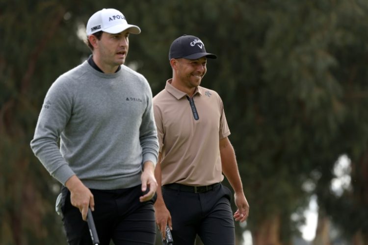 Americans Patrick Cantlay, left, and Xander Schauffele say changes might be needed in the Official World Golf Ranking to properly reward players in the LIV Golf League, who do not receive OWGR points in their series. ©AFP