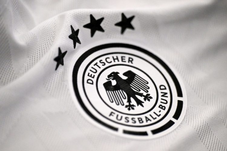 German Economy Minister Robert Habeck said he can 'hardly imagine the Germany shirt without the three stripes' of Adidas.. ©AFP