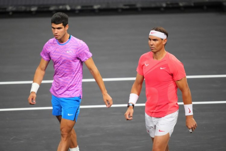 Spanish superstars Carlos Alcaraz and Rafael Nadal in action during The Netflix Slam tennis exhibition in Las Vegas, Nevada. ©AFP