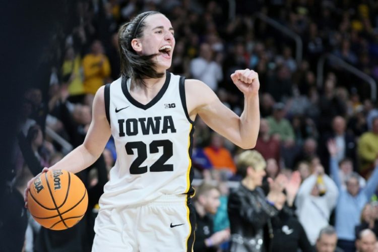 Caitlin Clark said she was happy after her first day of training camp with the WNBA's Indiana Fever, who earlier this month made her the top pick in the WNBA Draft. ©AFP