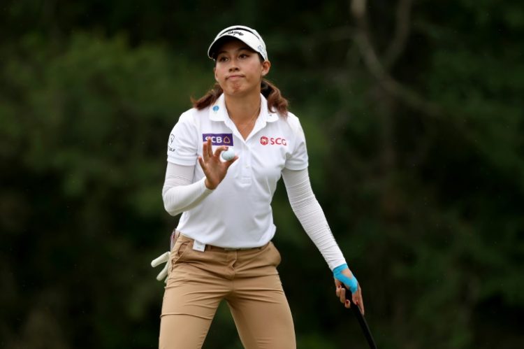 Thailand's Atthaya Thitikul reacts on the seventh green in the third round of the LPGA's Chevron Championship at Carlton Woods in The Woodlands, Texas. ©AFP