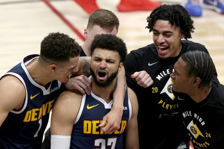 Jamal Murray celebrates his game-winning basket in Denver's series-clinching win over the Los Angeles Lakers. ©AFP
