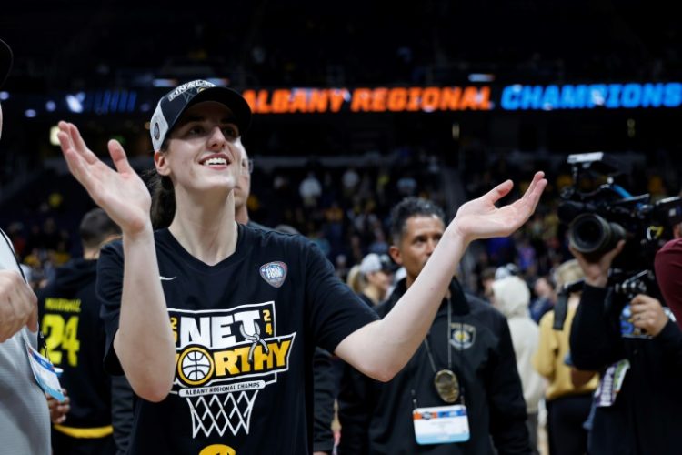 Iowa's Caitlin Clark celebrates after beating LSU 94-87 in what was the highest-rated US women's basketball telecast ever, with an audience of 12.3 million. ©AFP