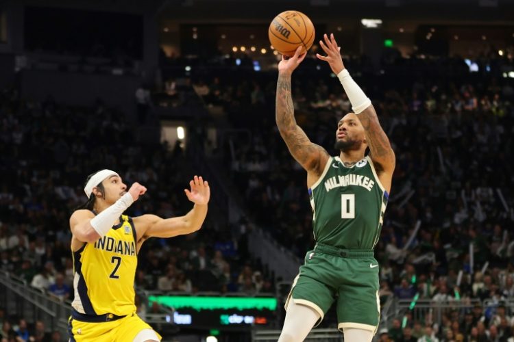 Damian Lillard of the Milwaukee Bucks shoots over Andrew Nembhard in the Bucks' victory over the Indiana Pacers in game one of their NBA Eastern Conference first round playoff series. ©AFP