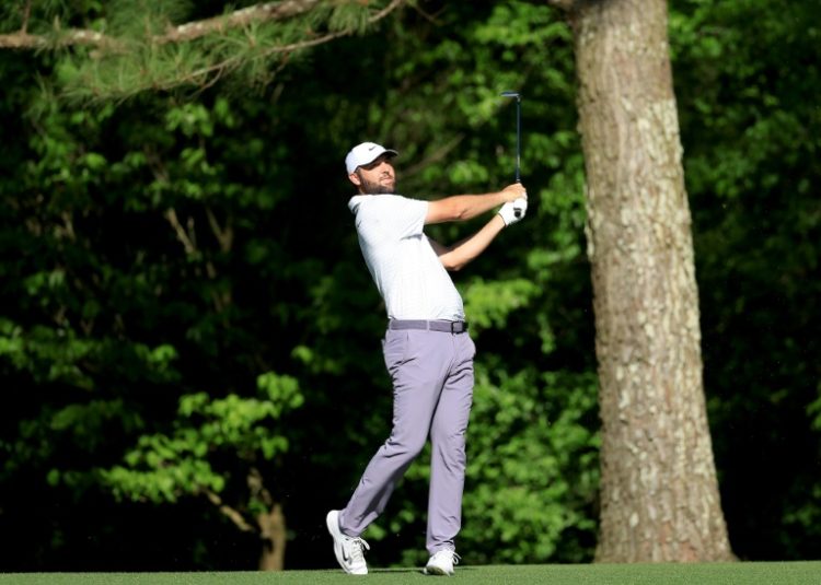 Scottie Scheffler of The United States plays his second shot on the 11th hole during the third round of the 2024 Masters Tournament at Augusta National Golf Club on Saturday.. ©AFP