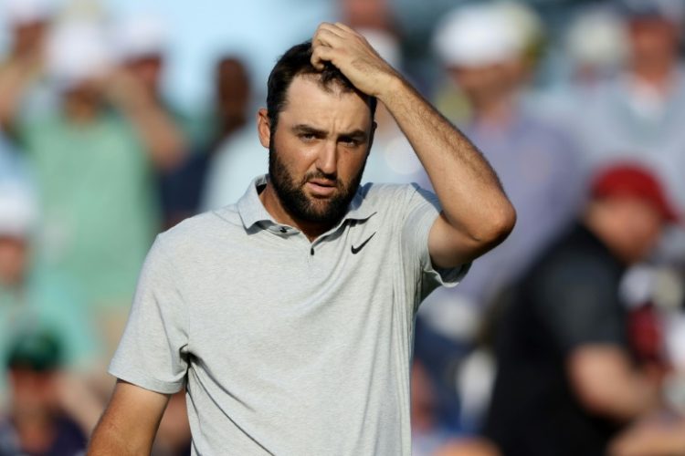 World number one Scottie Scheffler shot a six-under 66 to lay a stroke off the lead at the Masters on Thursday.. ©AFP