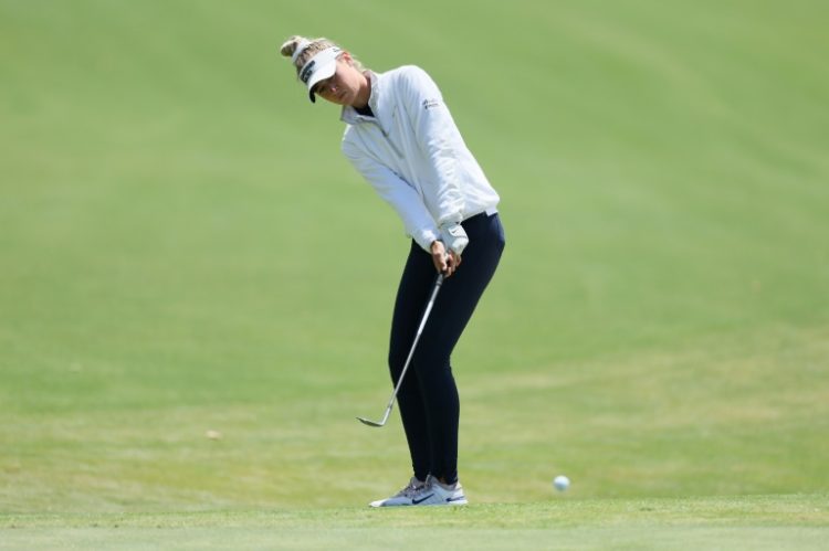 American Nelly Korda on the way to victory in the Chevron Championship, her fifth win in five starts to match an LPGA tour record. ©AFP