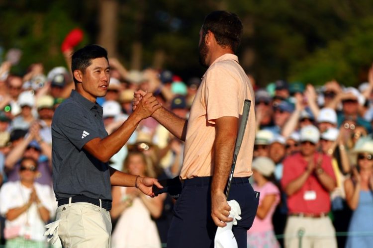 Two-time major winner Collin Morikawa, left, said he picked up some ways to boost his own game by watching playing partner Scottie Scheffler, right, in the final round of his victory at the 88th Masters. ©AFP