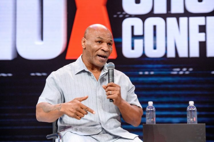 Former heavyweight boxing champion Mike Tyson, speaking earlier this month in Florida, will fight Jake Paul in July in Dallas,. ©AFP