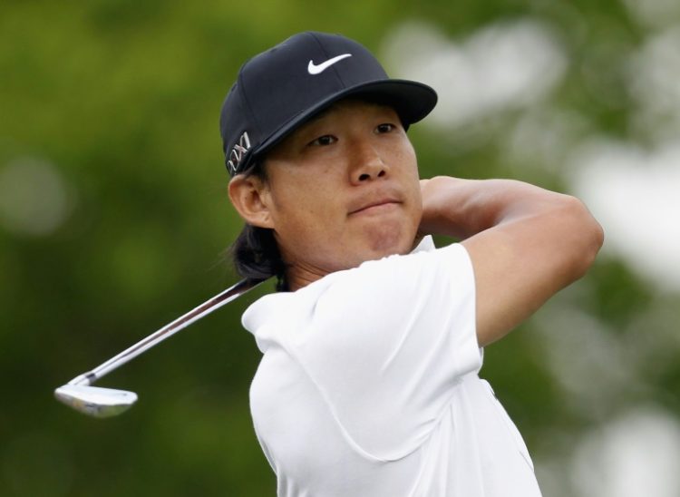 Anthony Kim watches his tee shot on the ninth hole at the Shell Houston Open at Redstone Golf Club on March 30, 2012.. ©AFP