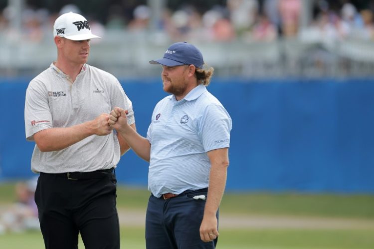 American pairing Patrick Fishburn and Zac Blair head the leaderboard heading into Sunday's final round of the PGA Tour's Zurich Classic of New Orleans at TPC Louisiana.. ©AFP
