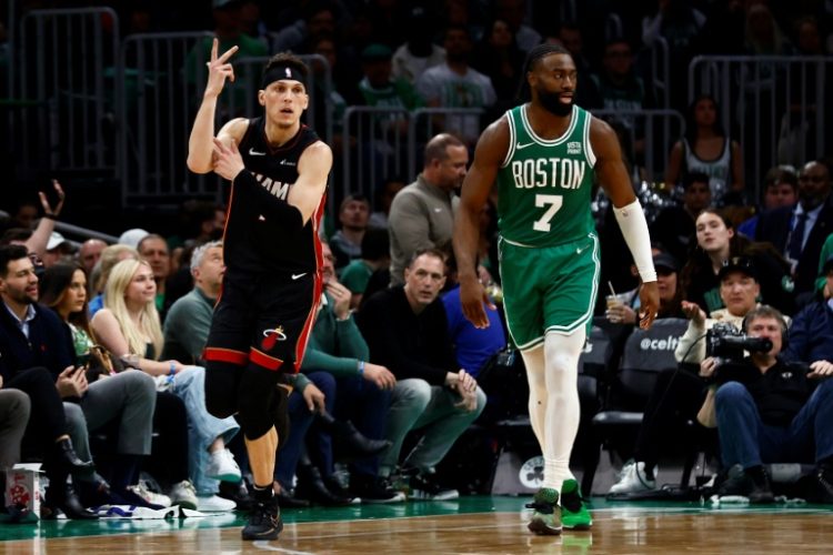Tyler Herro celebrates a three-pointer in Miami's upset victory over Boston in the NBA playoffs on Wednesday. ©AFP