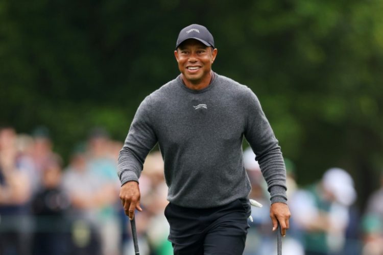 Tiger Woods reacts on the eighth hole during a practice round prior to the 88th Masters. ©AFP