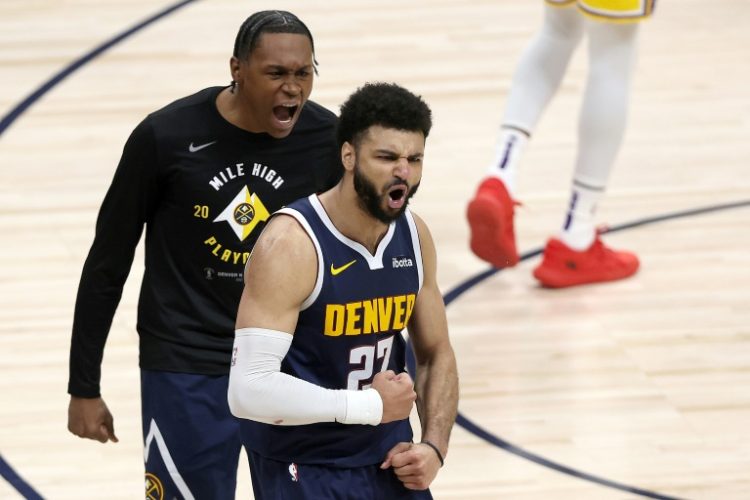 Jamal Murray celebrates the late basket that gave Denver a series-clinching 108-106 win over the Los Angeles Lakers. ©AFP