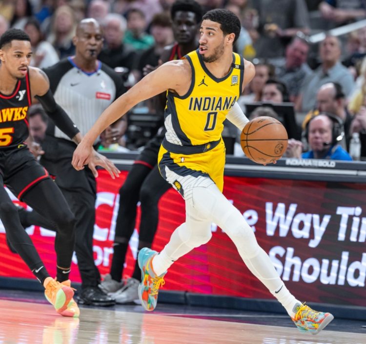 Indiana's Tyrese Haliburton brings the ball up court in the Pacers' blow-out victory over the New York Knicks in game four of their NBA Eastern Conference semi-final series. ©AFP