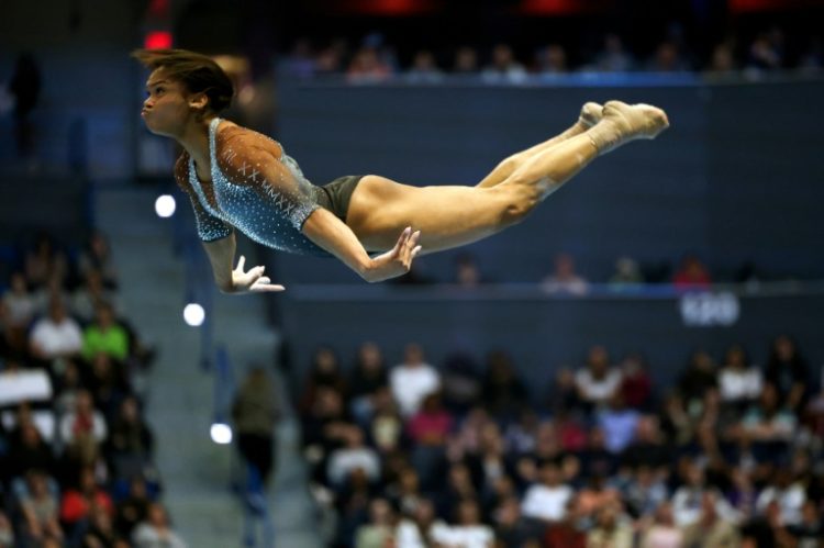 US gymnast Shilese Jones withdrew from this week's US national championships but hopes to land a berth in June's US Olympic trials and qualify for the Paris Games. ©AFP