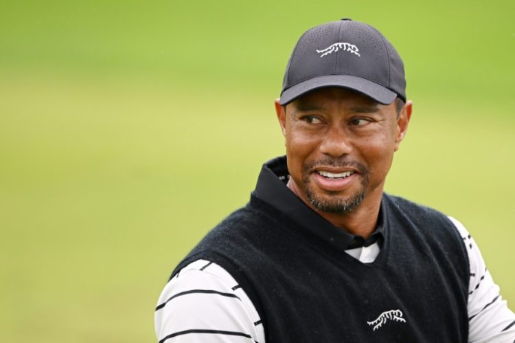 Tiger Woods, smiling during a practice round on Tuesday at the PGA Championship, says he remains in talks about possibly being captain of the 2025 US Ryder Cup team. ©AFP