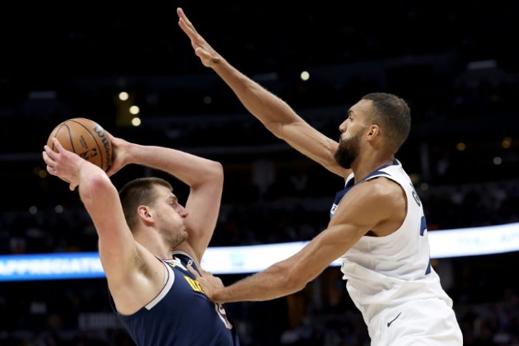 Minnesota's Rudy Gobert (right) is ready for another duel against Denver's Nikola Jokic (left) in their NBA playoff series starting on Saturday. ©AFP