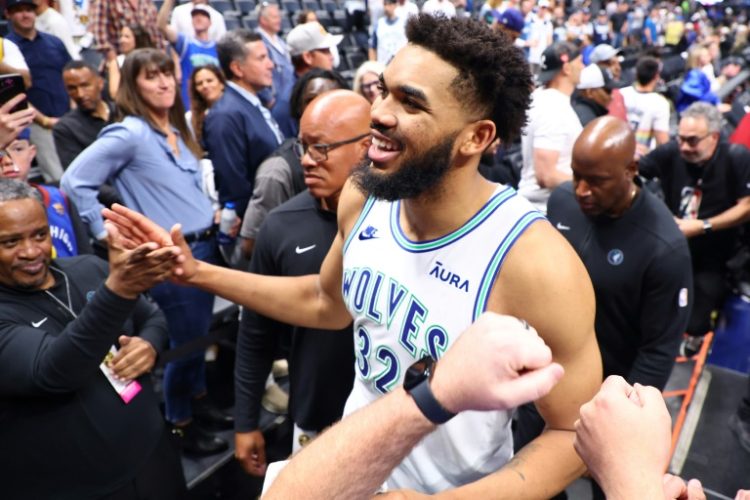 Minnesota's Karl-Anthony Towns celebrates after the Timberwolves' series-clinching victory over the Denver Nuggets in the NBA playoffs. ©AFP