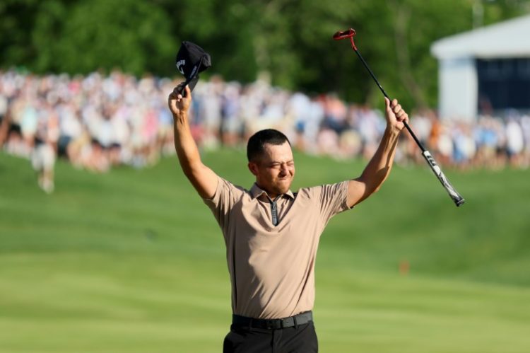 Third-ranked Xander Schauffele celebrates after sinking a six-foot birdie putt on the par-5 18th hole in the final round to win the PGA Championship at Valhalla. ©AFP
