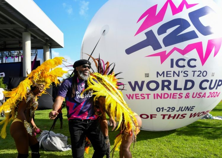 West Indies great Chris Gayle performs with dancers at a ceremony in February to mark 100 days until the start of T20 World Cup 2024. The 2024 tournament will be hosted by the West Indies and the United States from June 1 to 29. ©AFP