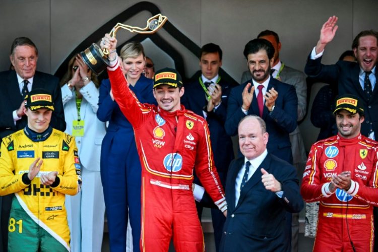 Charles Leclerc celebrates his first home Monaco Grand Prix alongside his Principality's head of state, Prince Albert II. ©AFP