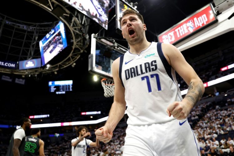 Luka Doncic of the Dallas Mavericks celebrates during the fourth quarter of the Mavs' series-clinching NBA victory over the Minnesota Timberwolves. ©AFP