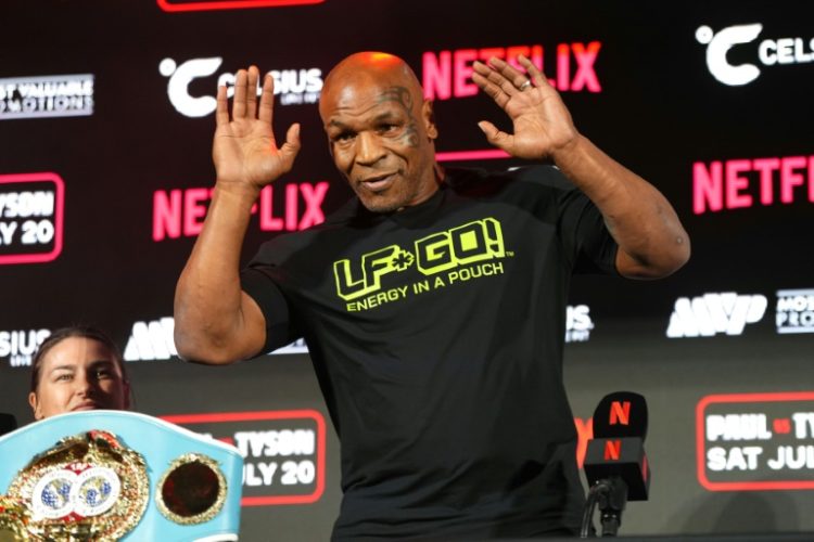 Mike Tyson says he feels '100%' after a recent health scare ahead of his July 20 fight with Jake Paul. ©AFP