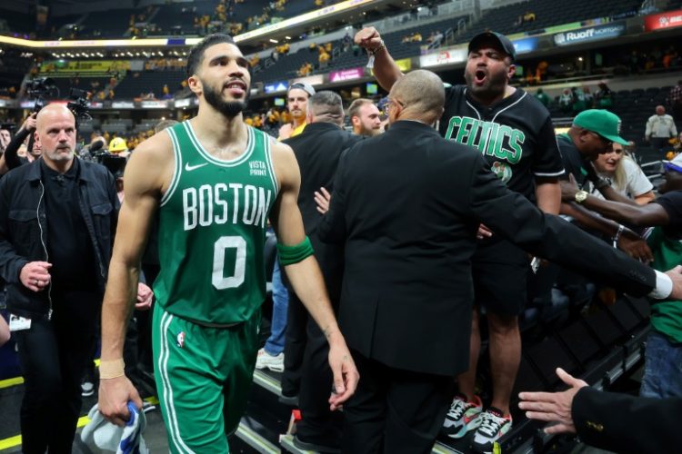 Boston's Jayson Tatum walks off the court after the Celtics' victory over the Indiana Pacers in game three of the NBA Eastern Conference finals. ©AFP