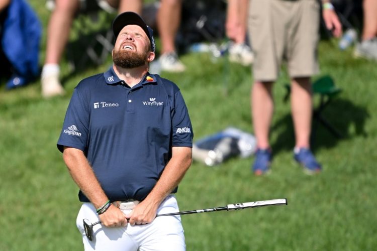 Ireland's Shane Lowry reacts on the 18th green after matching the all-time low round in major golf history with a nine-under par 62 in the third round of the PGA Championship at Valhalla. ©AFP