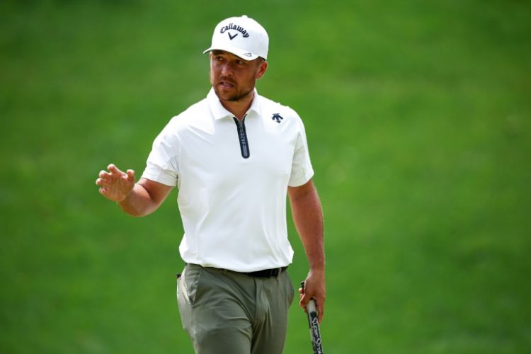 Xander Schauffele fired a four-under par 67 to grab the lead at the storm-hit PGA Wells Fargo Championship. ©AFP