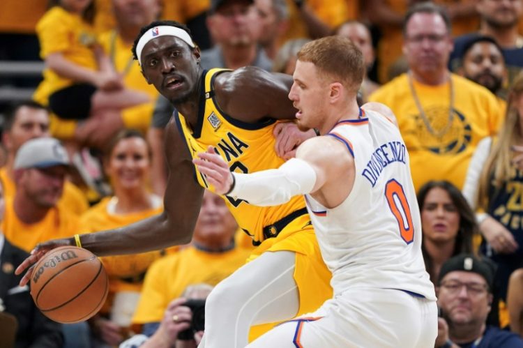 Indiana's Pascal Siakam drives against Donte DiVincenzo in the Pacers' series-tying victory over the New York Knicks in their NBA Eastern Conference semi-final series. ©AFP