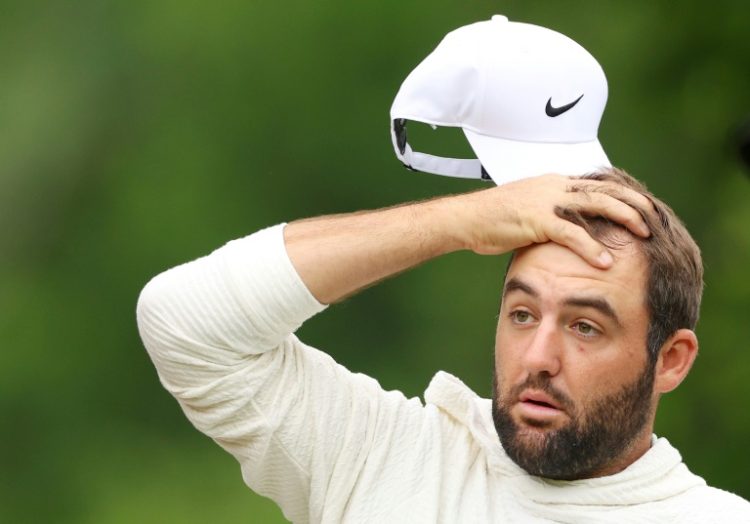 Top-ranked new father Scottie Scheffler reacts to a shot on the second hole during a practice round ahead of the 106th PGA Championship at Valhalla. ©AFP