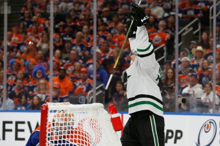 Jason Robertson of the Dallas Stars celebrates after his third goal during the third period in Game Three of the Western Conference Final of the 2024 Stanley Cup Playoffs.. ©AFP
